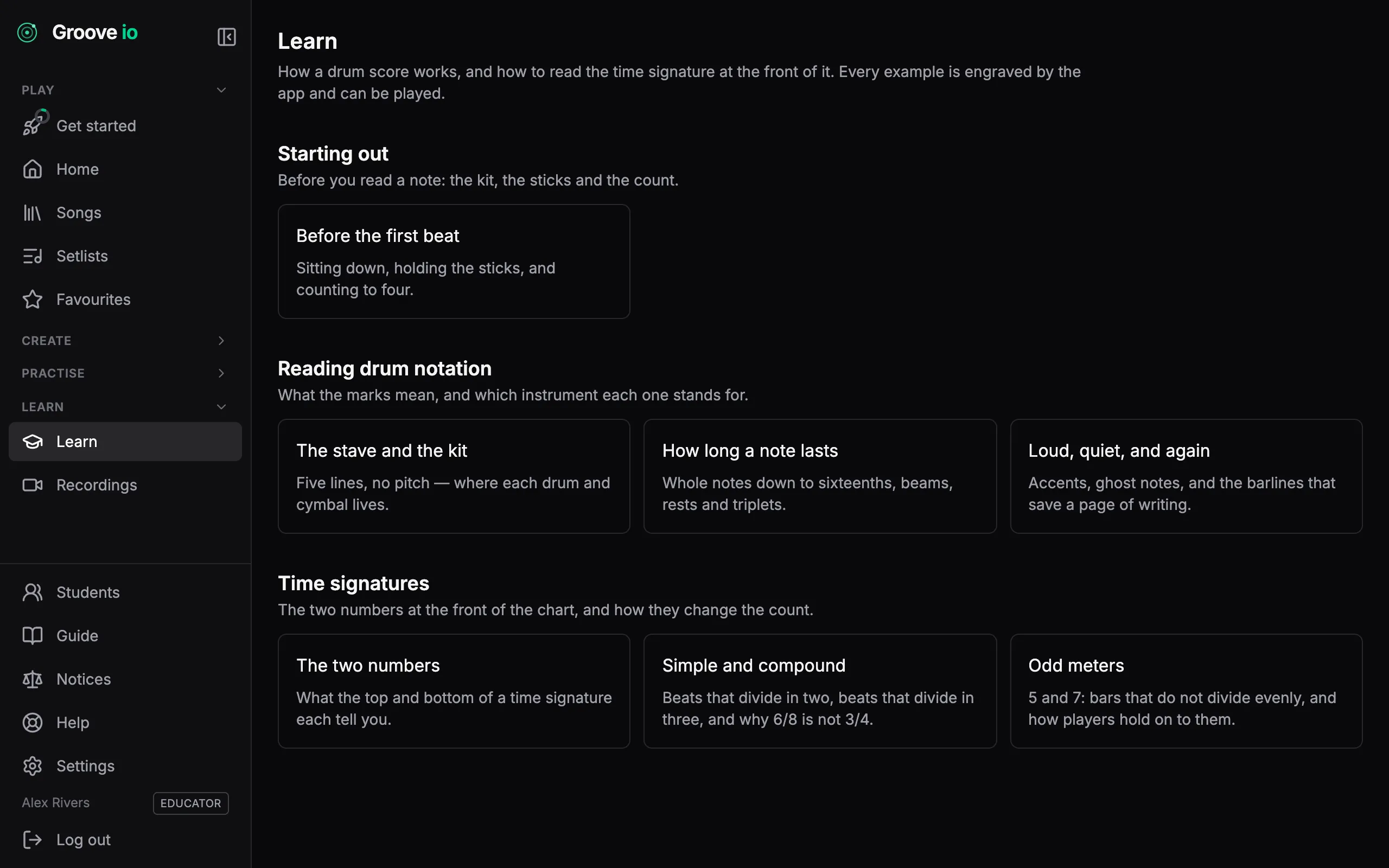 The Learn section, with lessons on reading drum notation and time signatures