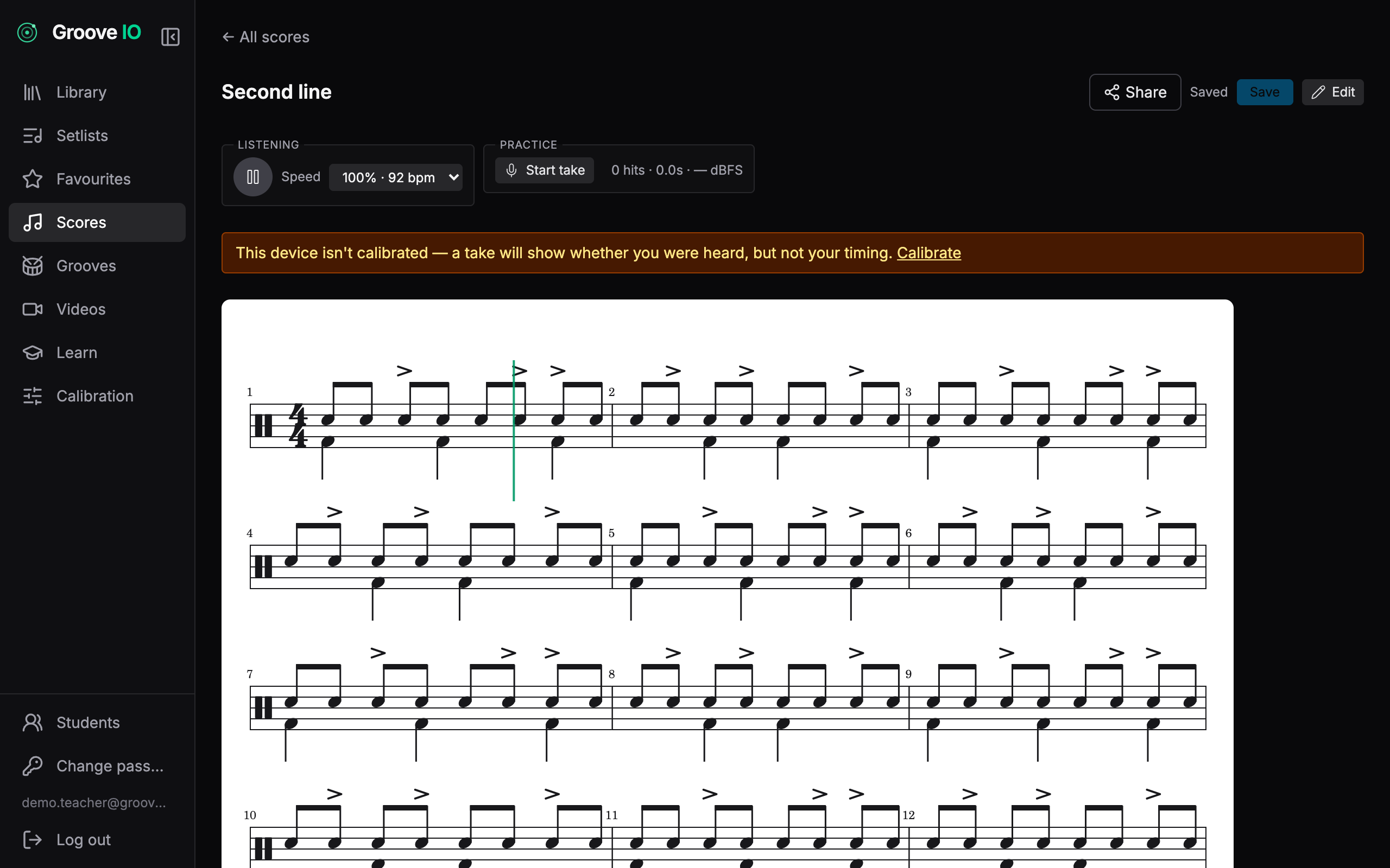 A drum score in Groove IO scrolling in time with the track, playhead partway through a bar