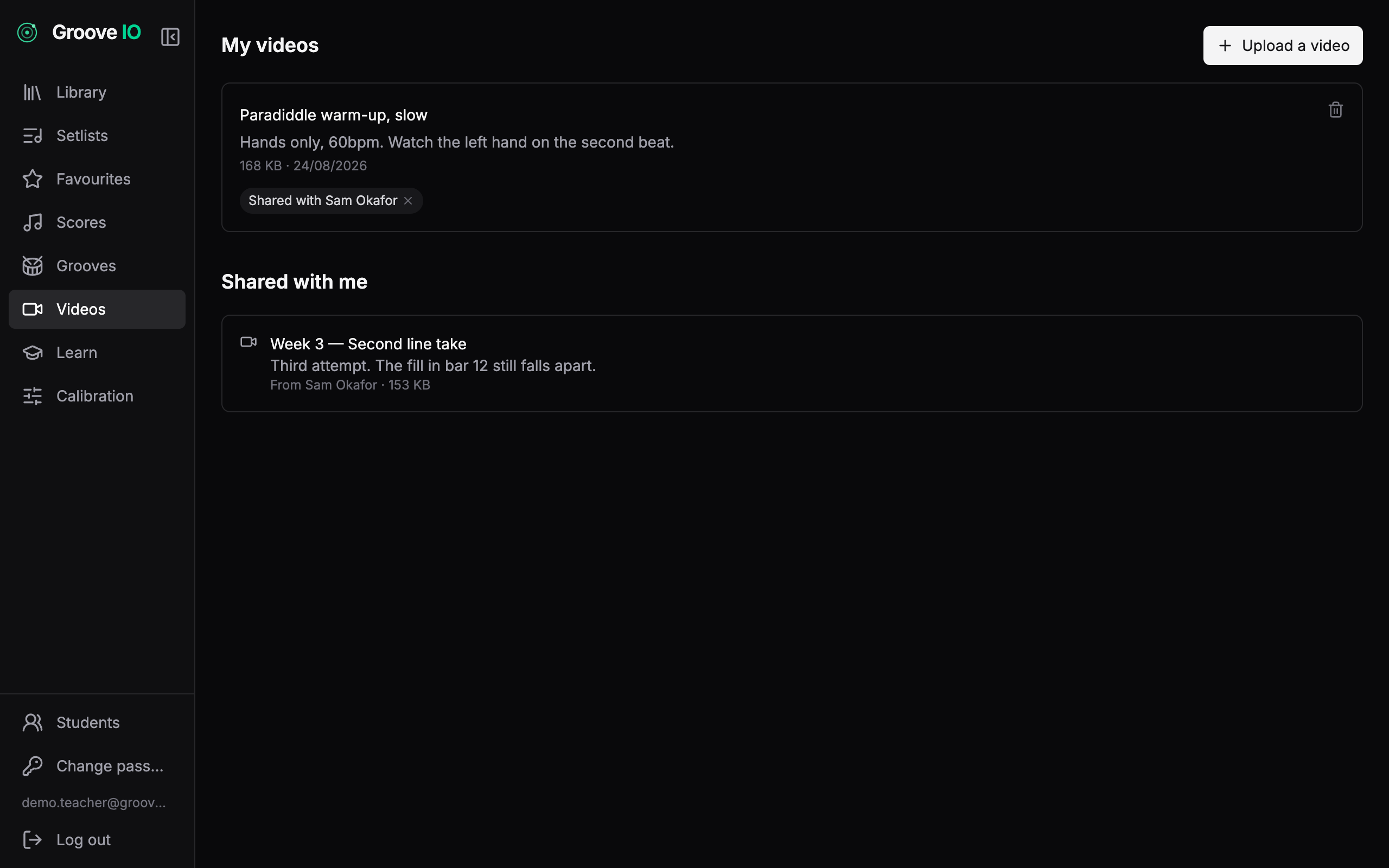 The Groove IO videos page showing a video shared with a named student, and one shared back